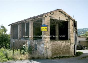 Porzione di stabile con terreno