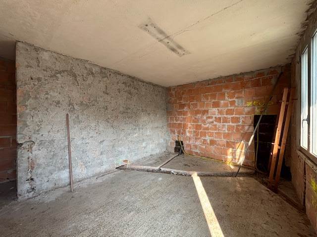 soggiorno cottura del bilocale al grezzo 